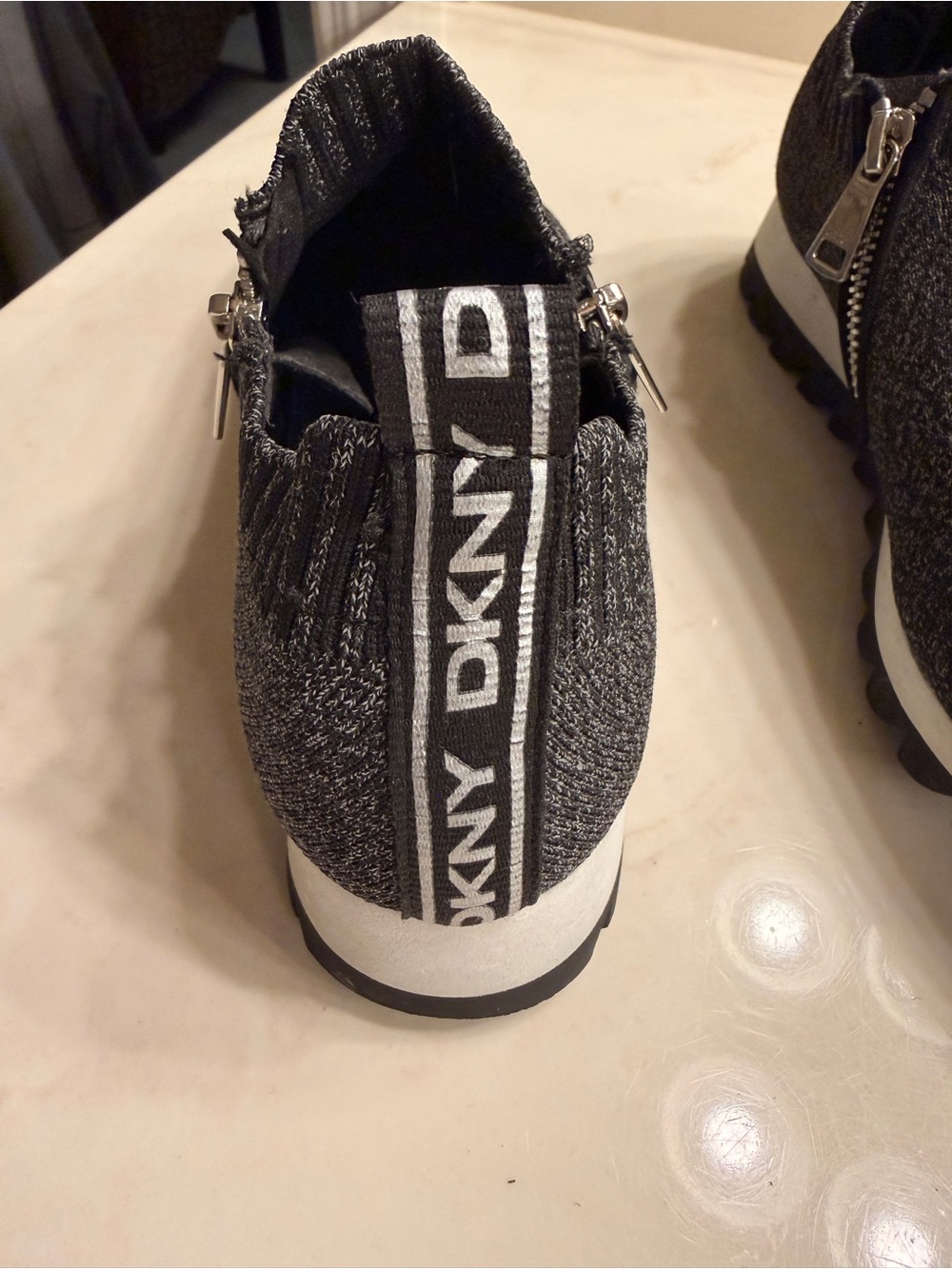 DKNY women’s Gray and White Knit Logo-Strip Slip-On Sneakers with zipper